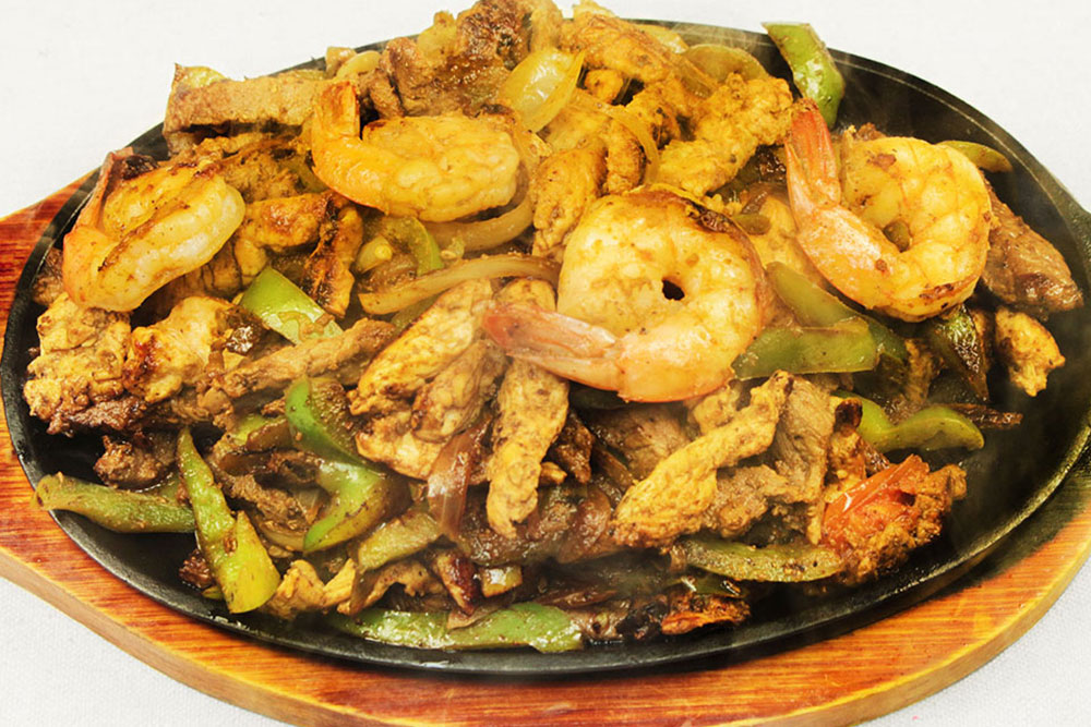La Casita Cafe sizzling fajitas image menu